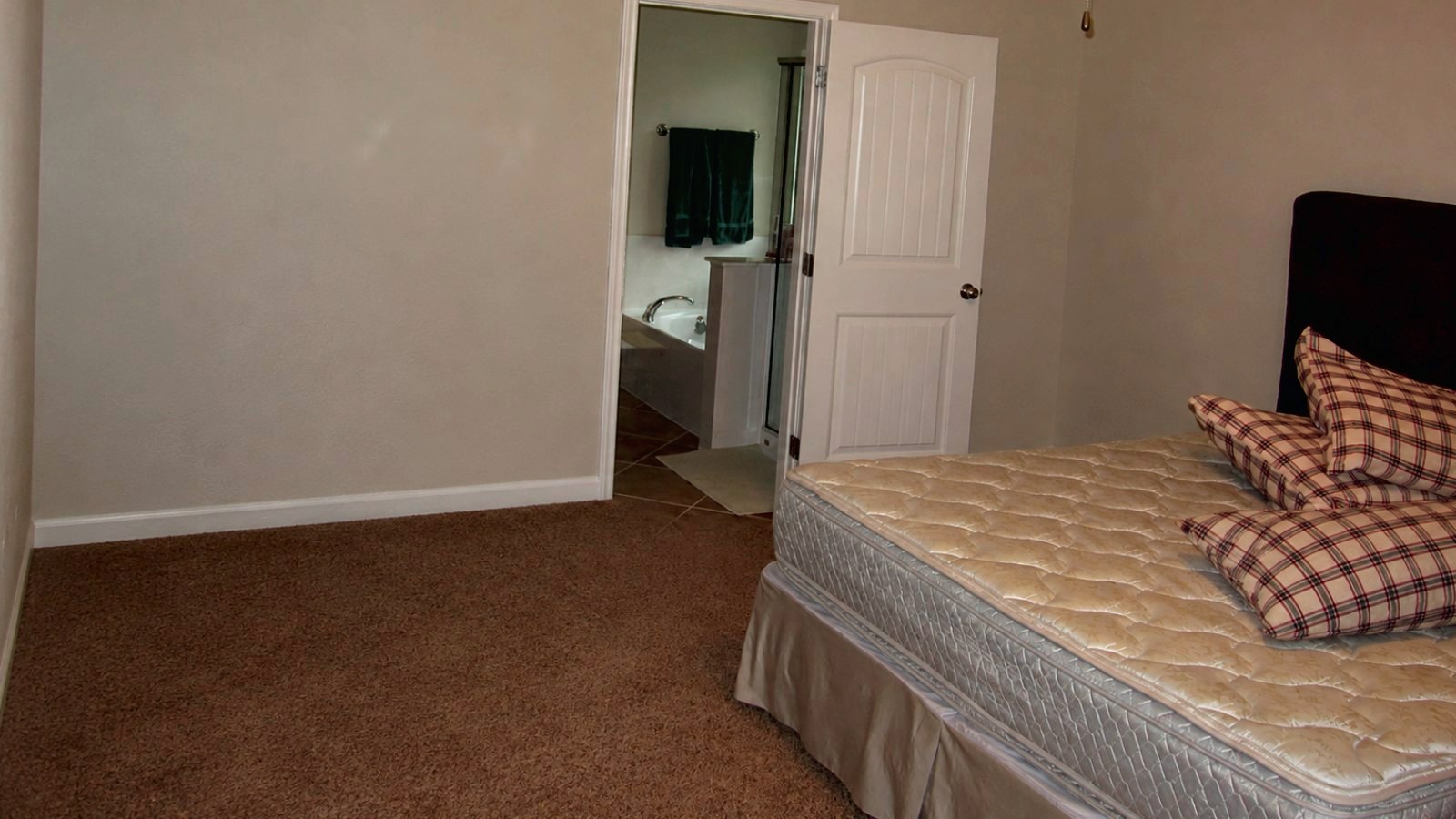 The same bedroom after the moving boxes were removed